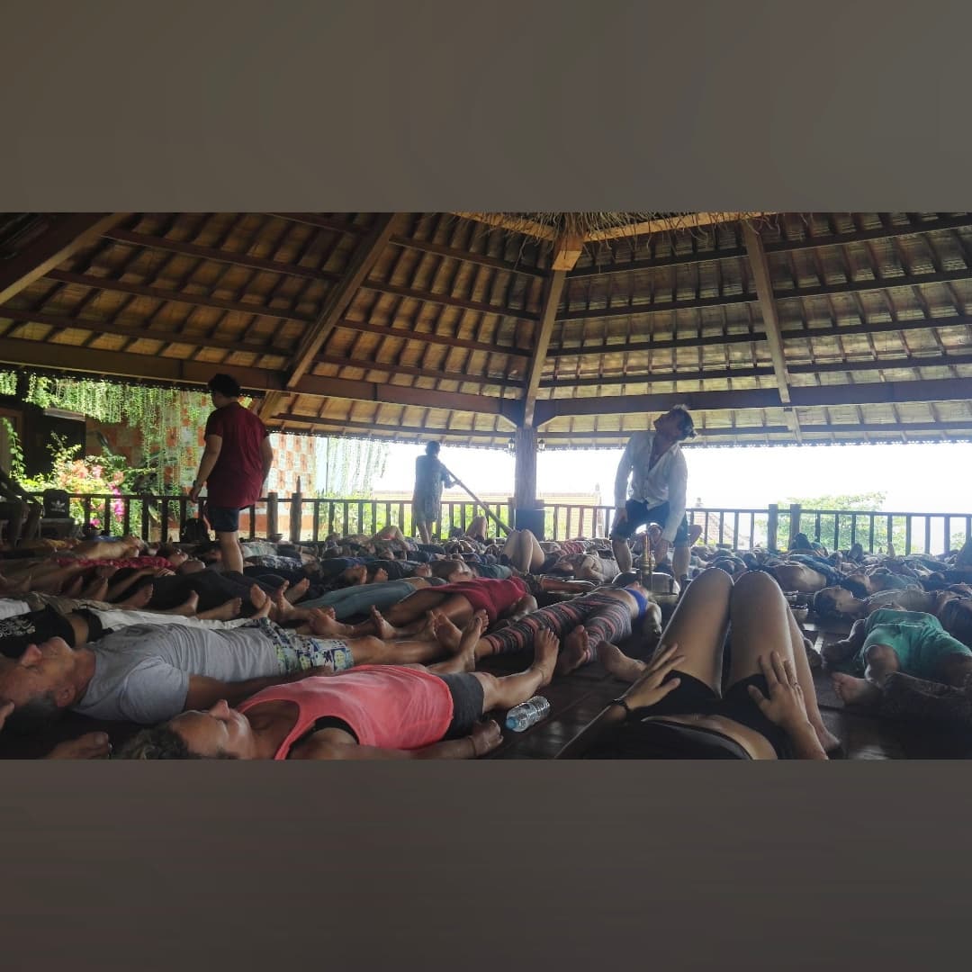 Large group session under a Balinese roof