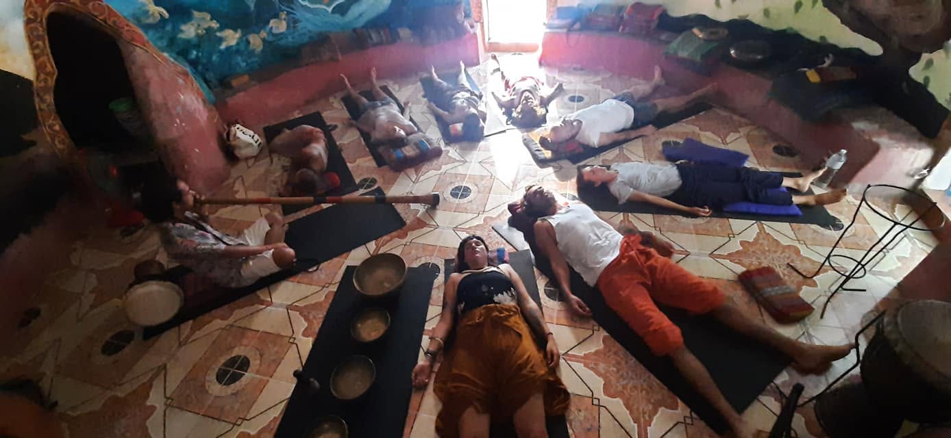 A circle of participants in deep rest