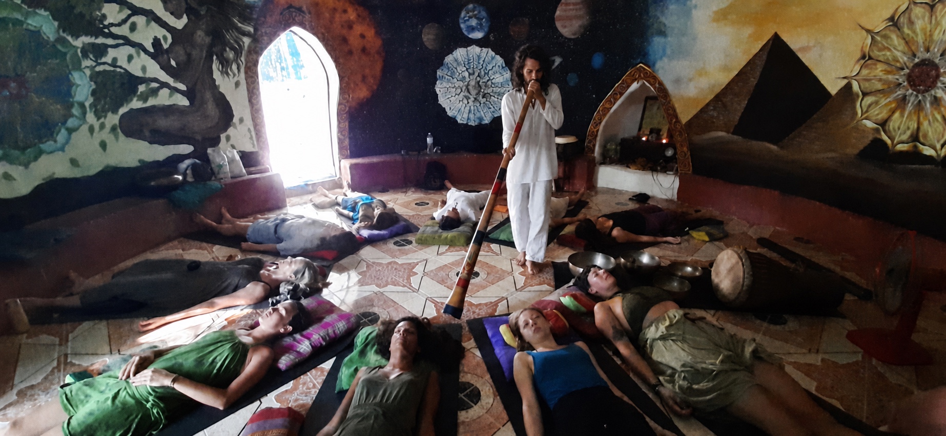 Session space with singing bowls, candlelight and painted walls