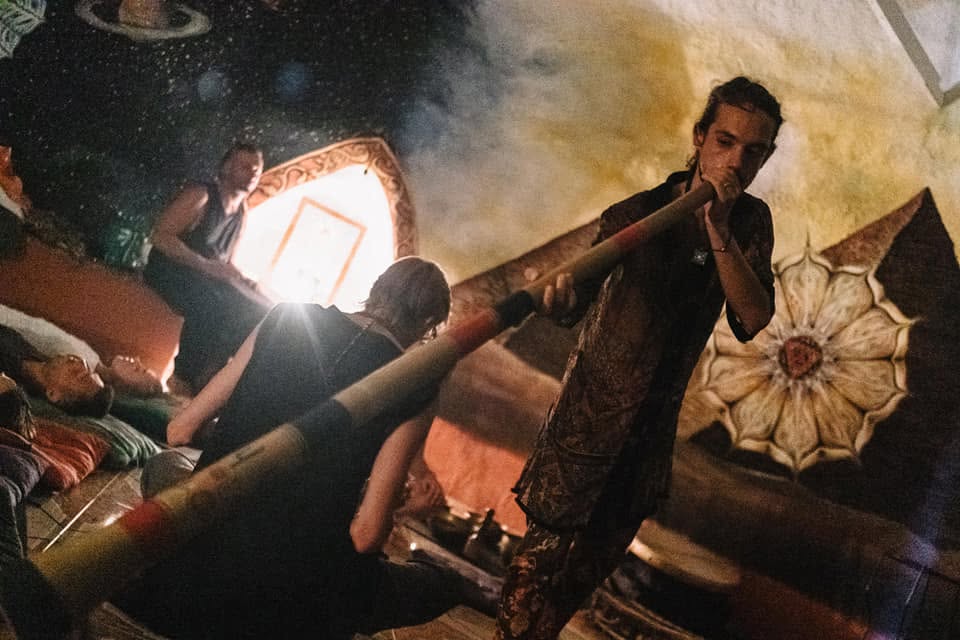 Didgeridoo played over the group